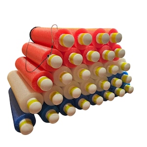 May include: A stack of colorful foam pool noodles in red, white, and blue. The noodles are stacked in a pyramid shape and have yellow stripes.