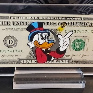 Moneymaker McDuck - Dollar Art | en un billete de dólar real, regalo original, obra de arte pintada a mano, pieza única