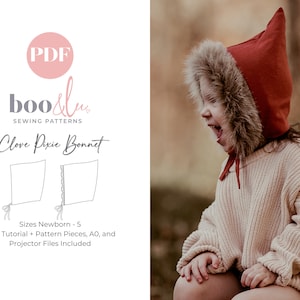 May include: A red pixie bonnet with faux fur trim is worn by a child. The bonnet has a pointed top and ties under the chin. The image also shows a sewing pattern with the text "Clove Pixie Bonnet" and "Sizes Newborn - 5".