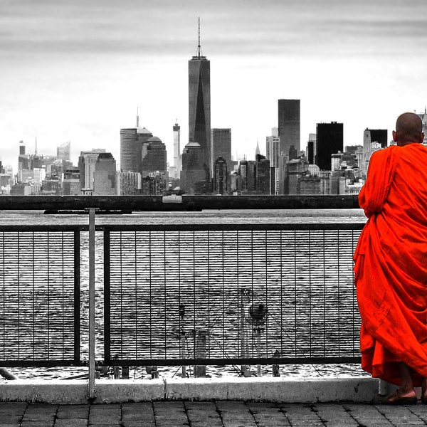 Buddhist monk in red color robe looking over the New York City skyline, digital print, urban cityscape wall art or trendy wall print