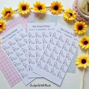 May include: Three white cards with black outlines of high-heeled shoes. Each card has the text "Shoes Savings Challenge" and "Each heel = $5 BudgetWithMads Total = $90".