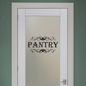 May include: Black and white pantry door sign with a decorative flourish and the word "PANTRY" in all caps.