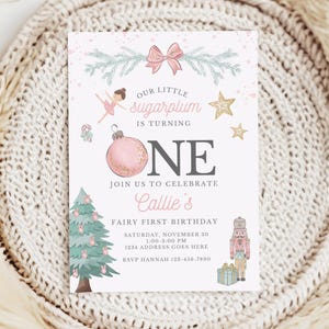 くるみ割り人形の誕生日招待状、シュガープラムの妖精のクリスマス1歳の誕生日招待状（女の子向け）、ピンクのくるみ割り人形の1歳の誕生日招待状（Canva用）