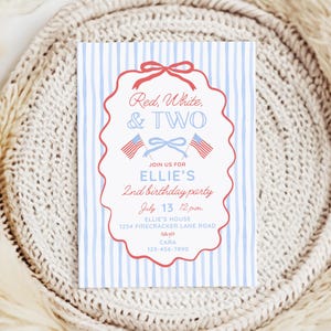 May include: A rectangular birthday party invitation card with a light blue vertical striped background. The center features a red scalloped frame with a bow, two small American flags, and text reading Red, White, & TWO, Ellie's 2nd birthday party, July 13 12pm, Ellie's house, 1234 Firecracker Lane Road, and contact details.