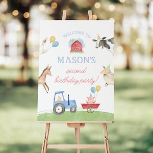 May include: A white rectangular birthday party sign featuring watercolor illustrations of a red barn, a blue tractor, and farm animals wearing party hats. The text reads: WELCOME TO MASON'S second birthday party! Balloons are included in the design.