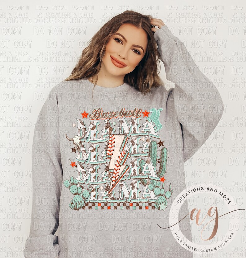May include: A gray sweatshirt with a graphic design of the word "Baseball Mama" in a distressed font with a lightning bolt and cactus accents. The design is in shades of teal, brown, and white.