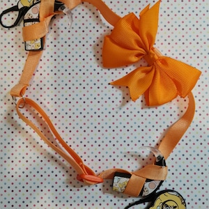 Non-slip headband for cochlear implant and hearing aids with adjustable size and sliding knot