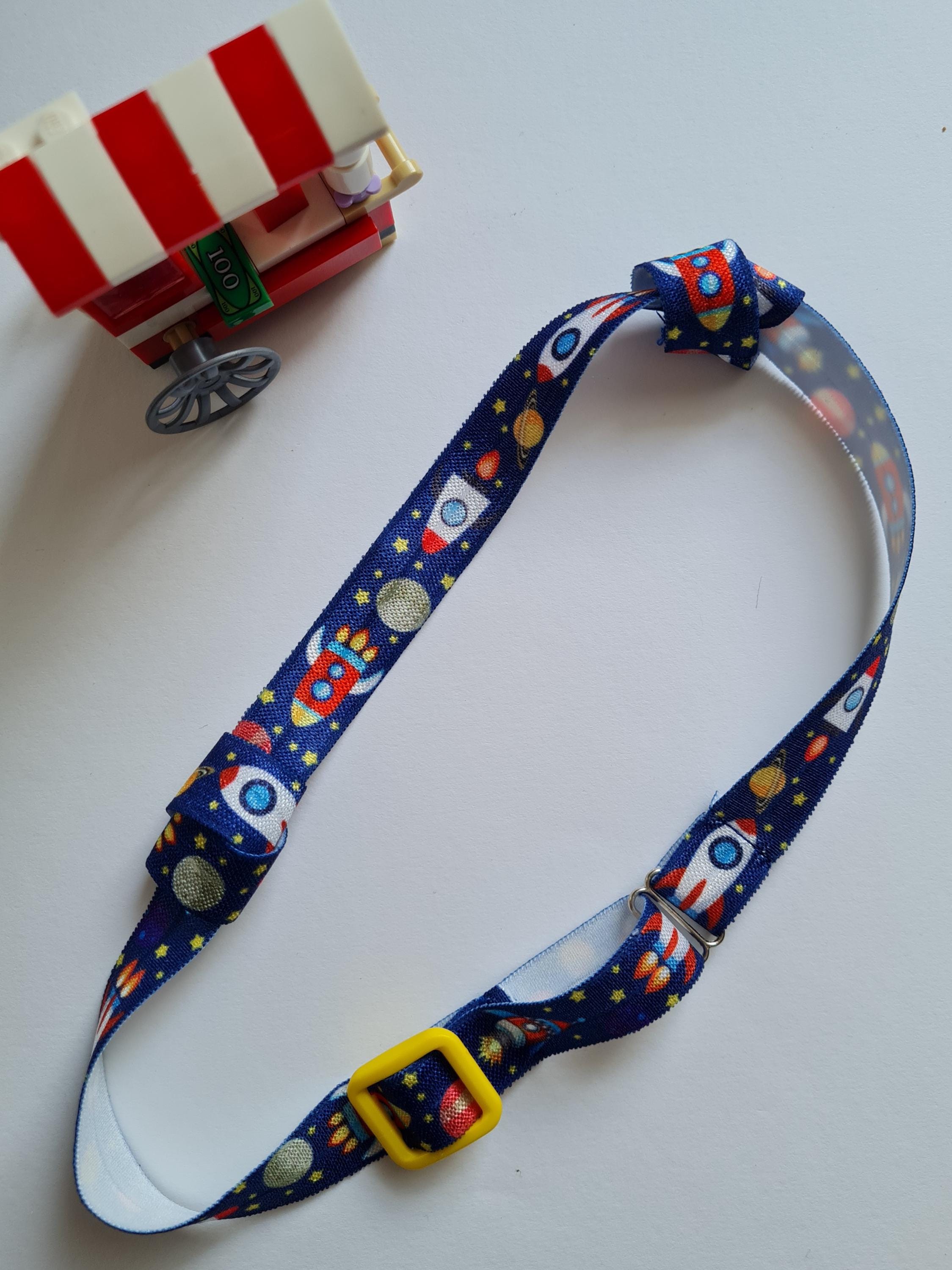 Confezione da 1 fascia per capelli con pompon in lamina di