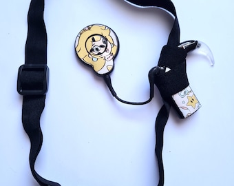 Fascia regolabile non lucida per impianti cocleari e protesi