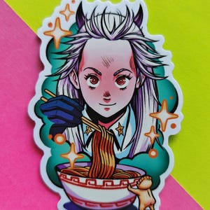 May include: A die-cut sticker featuring an anime-style character with spiky white hair and horns, wearing a white collared shirt with star details. The character uses chopsticks to eat noodles from a bowl, while a small figure clings to the side.