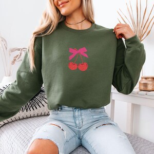 Embroidered Coquette Cherry Sweatshirt, Cherry Bow Sweater, Minimalist Red Cherry Crewneck, Trendy Girly Cherries Sweatshirt, Gift For Her Military Green