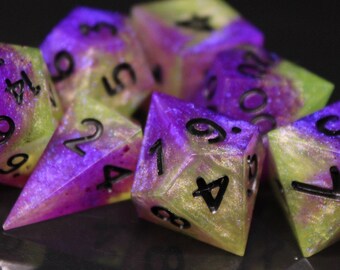 Shifting Purple and Green - 7 Piece Dice Set (Purple, Green, Blue and Black)