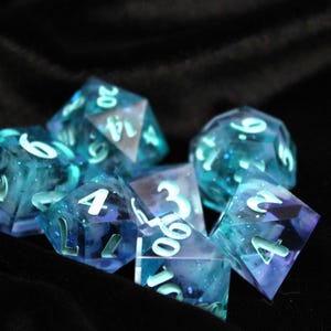 Teal Glitter - 7 Piece Dice Set (purple and blue/teal dice)