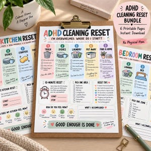 May include: A set of printable ADHD cleaning reset checklists on white paper, secured to a brown clipboard. The pages feature colorful icons, numbered steps for tasks like trash, dishes, and laundry, mood trackers, and sections for notes.