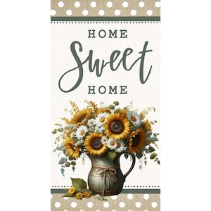 Puede incluir: Un fondo blanco con el texto "Home Sweet Home" en una fuente verde oscura. Una jarra llena de girasoles y margaritas blancas se encuentra en el centro de la imagen. La jarra está atada con un lazo de cuerda marrón. El fondo es una tela de arpillera con lunares blancos.