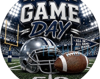 May include: A circular graphic featuring a silver football helmet and a brown football on a field. The text reads GAME DAY and ALL IN ALL GAME ALL SEASON. A yellow goalpost stands on the left, and a blue pennant flag is on the right under stadium lights.