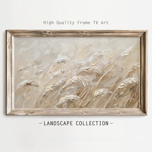 Puede incluir: Una pintura enmarcada de un paisaje con hierba alta en tonos beige y blanco. La pintura está en un marco de madera rústico. El texto "LANDSCAPE COLLECTION" está debajo del marco.