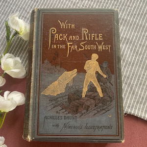 Impresión de 1886 / Con mochila y rifle en el lejano suroeste / Libro de decoración vintage