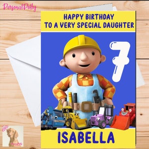 May include: A blue birthday card featuring a cartoon image of Bob the Builder. The card reads "Happy Birthday to a Very Special Daughter" and includes the number 7. The name Isabella is printed at the bottom of the card.