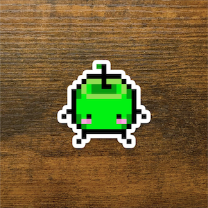 May include: A green pixelated character with a small stem on top and pink cheeks. The character has black outlines and is standing on two small legs.