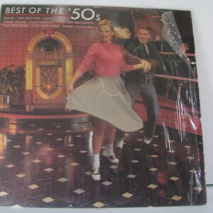 May include: Album cover for "Best of the '50s" showing a couple dancing in a diner. The artwork includes a jukebox and the names of artists from the 1950s.