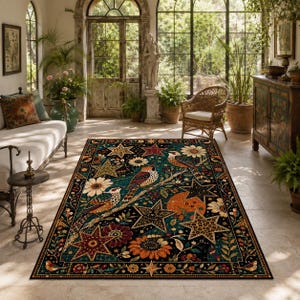 May include: A rectangular area rug featuring a dark teal background with a repeating pattern of birds perched on branches, large orange and yellow sunflowers, and various stars in shades of gold, red, and black, finished with a decorative border.