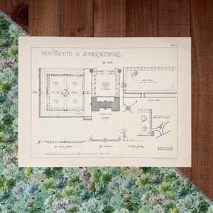 May include: A vintage architectural plan of Montacute in Somersetshire, featuring detailed drawings of gardens, courtyards, and buildings. The black and white illustration includes text labels and a scale in feet, presented on aged paper.