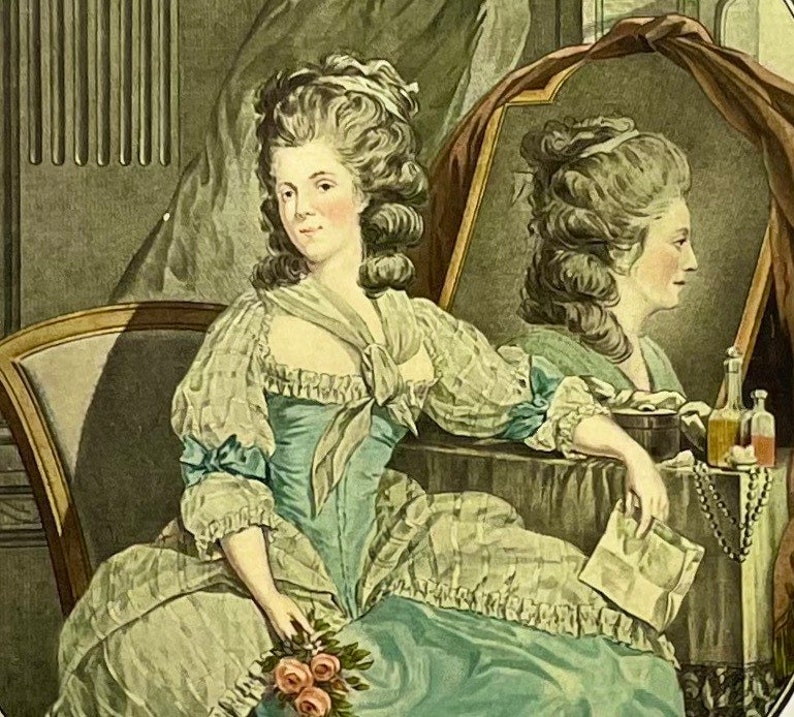 May include: A woman in a blue and white dress sits in a chair, looking at her reflection in a mirror. She holds a bouquet of pink roses in her hand. The mirror is decorated with a gold frame and a red curtain.