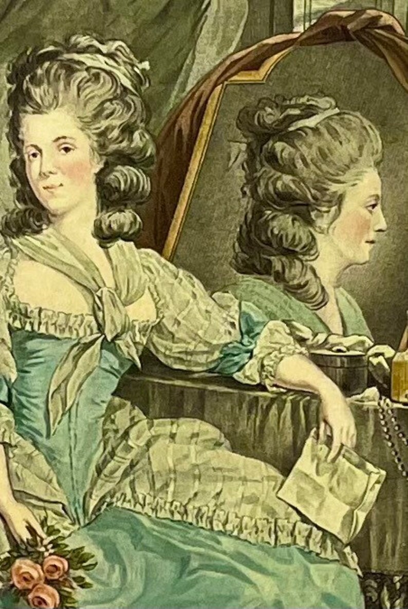 May include: A painting of two women in 18th-century dress. The woman on the left is wearing a light blue dress with a white lace collar and a white bow at the neck. The woman on the right is reflected in a mirror, wearing a similar dress with a white lace collar and a white bow at the neck.