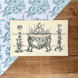 May include: An antique print featuring a commode table design with two candle stand designs. The black and white illustration shows ornate furniture with detailed carvings and decorative elements. The print is on a cream-colored background.