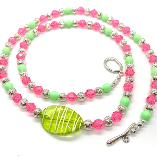 Soft Pink & Green Handcrafted Acrylic Necklace is splashed with Silver and has Green handpainted focal bead.  Think summer all year!