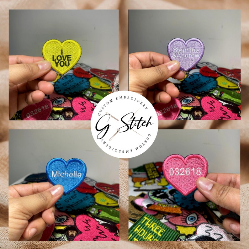 May include: A selection of heart-shaped embroidered patches in various colours, including yellow, purple, blue, and pink. Each patch displays custom text, such as "I LOVE YOU", names, and dates. The patches are held up against a backdrop of other colourful patches.