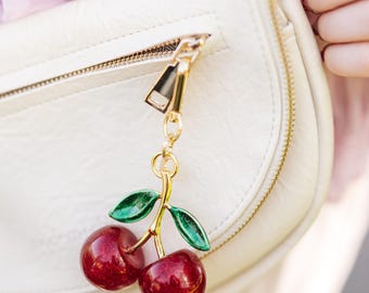 Sparkling Red Cherry Charm: Playful Bag Accessory