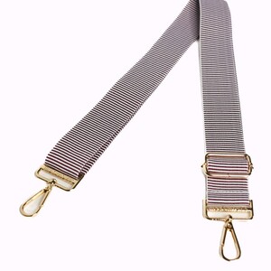 A purple and white striped strap.