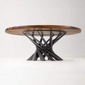May include: A round wooden table with a dark brown finish. The tabletop rests on a black, geometric metal base. The table's design features a natural wood grain and a modern aesthetic.