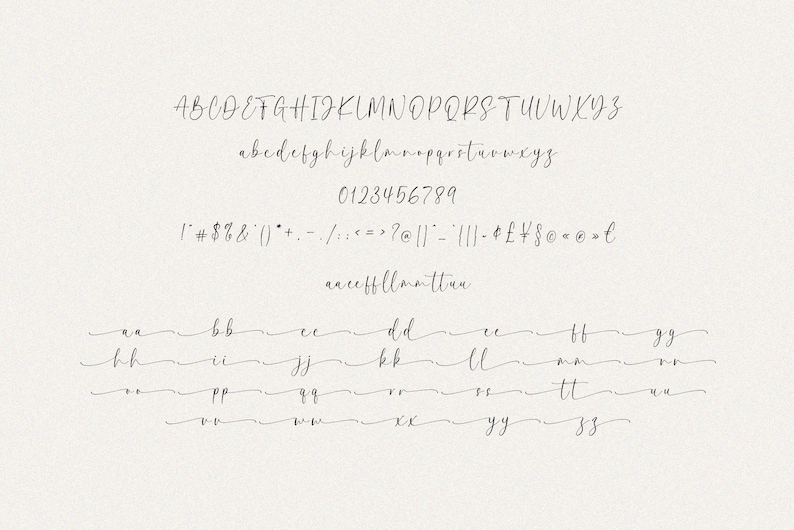 May include: A handwritten font alphabet in black ink on a white background. The alphabet includes uppercase and lowercase letters, numbers, and punctuation marks.
