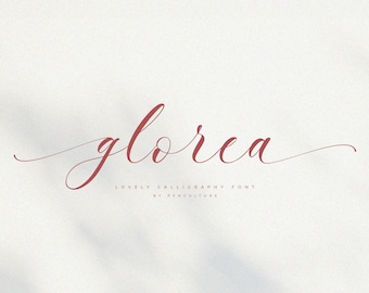 May include: A calligraphy font named "gloria" in a red-brown colour. The text "LOVELY CALLIGRAPHY FONT BY PENCULTURE" is below the font name.