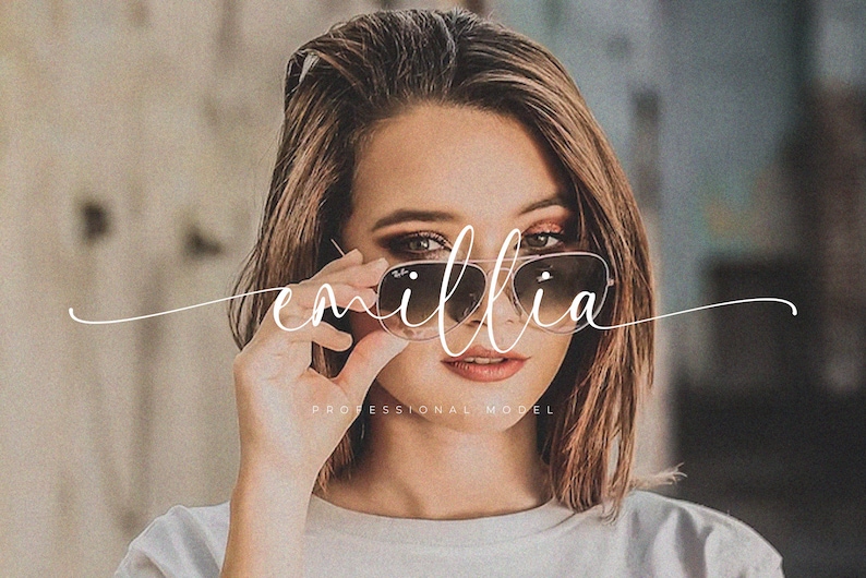 May include: A woman with brown hair wearing sunglasses and a white shirt. The text "emillia professional model" is written in white cursive script across the image.