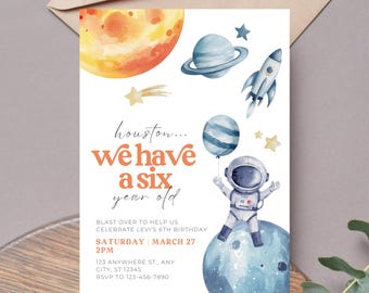 May include: A white invitation card with a watercolor space theme. It features a planet, rocket, astronaut, and the text "Houston... we have a six year old." The invitation is for a birthday party.