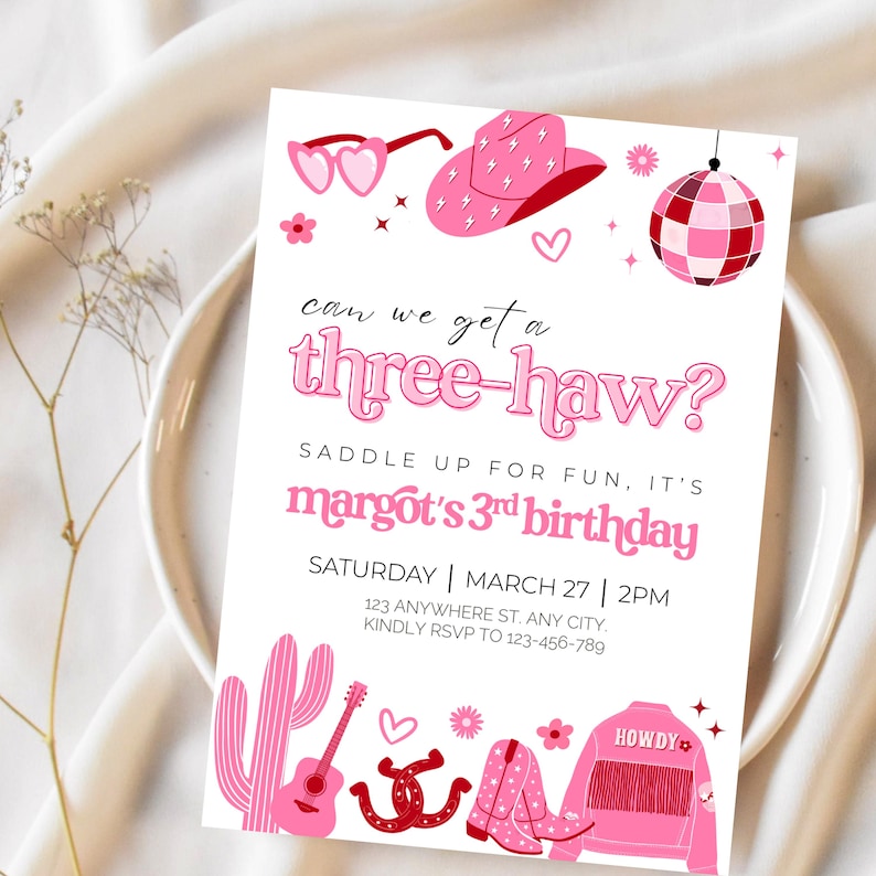 May include: Pink and red birthday party invitation with the text "can we get a three-haw?" and "margot's 3rd birthday". The invitation includes a cactus, a guitar, a horseshoe, cowboy boots, a denim jacket, a cowboy hat, sunglasses, and a disco ball.