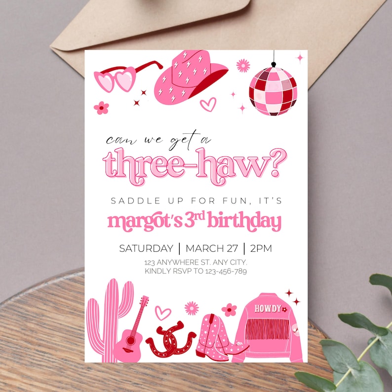 May include: Pink and red birthday party invitation with the text "can we get a three-haw?" and "margot's 3rd birthday". The invitation features a cowboy hat, sunglasses, a disco ball, a cactus, a guitar, a horseshoe, cowboy boots, and a denim jacket.