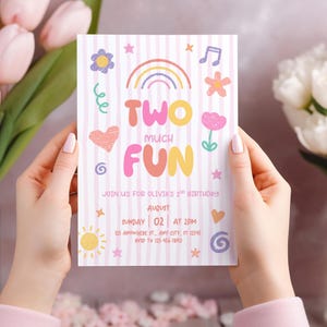 May include: A birthday invitation with a pink and white striped background. The text "TWO MUCH FUN" is in large, colorful letters. The invitation includes the date, time, and location for Olivia's 2nd birthday party, with decorative elements like a rainbow and flowers.