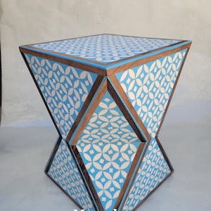 Uniquely shaped table handcrafted from walnut wood and black resin. Strange shaped table blue table