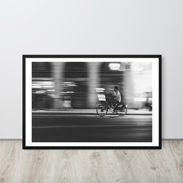 Elegance in Motion: Artistic Panning Shot of a Man on Bicycle in Paris