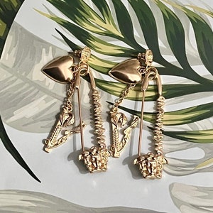 Versace charm drop earrings top