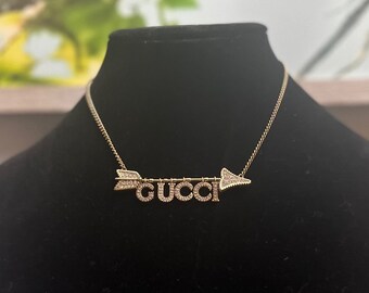 Fashion Bullseye: Gucci Arrow Pendant