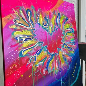 May include: Abstract painting on canvas with a heart shape formed by colorful swirls and lines. The background is a vibrant pink with splashes of color.
