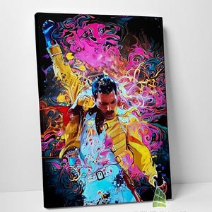 May include: A colourful canvas print depicting a man with a moustache, in a yellow jacket and light blue shirt. The background is a swirl of pink, purple, and yellow. The text "INFINITY WALL ART" is visible.