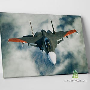 May include: A black and red fighter jet flies through a cloudy sky. The jet has a long, pointed nose and swept wings. The clouds are white and fluffy.