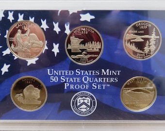 Juego de monedas de prueba de 50 cuartos de dólar de los Estados Unidos de 2005, acuñadas en la Casa de la Moneda de los Estados Unidos (50 estados) – 5 monedas en su embalaje original.